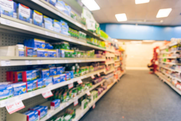 istock Blurry background American pharmacy store with various pharmaceutical and medicines 1031979446