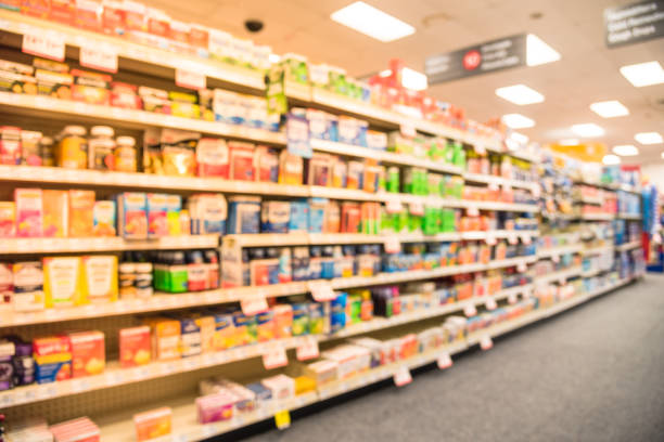 istock Blurry background American pharmacy store with various pharmaceutical and medicines 1031979788