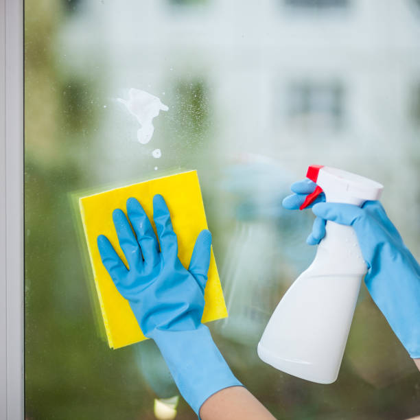 istock Hand in glove washes a window 1031980854