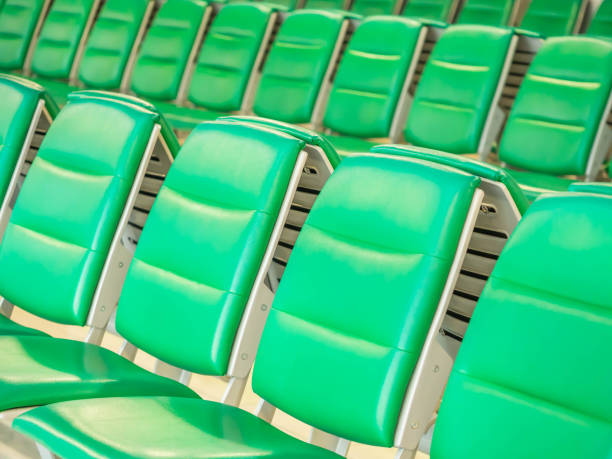 istock Green airport waiting chairs or seating within the terminal. 1031981662