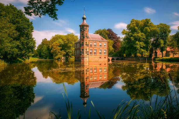 Castle Bouvigne and the surrounding park with reflection in water situated near the Dutch city of Breda in Netherlands. Long exposure.