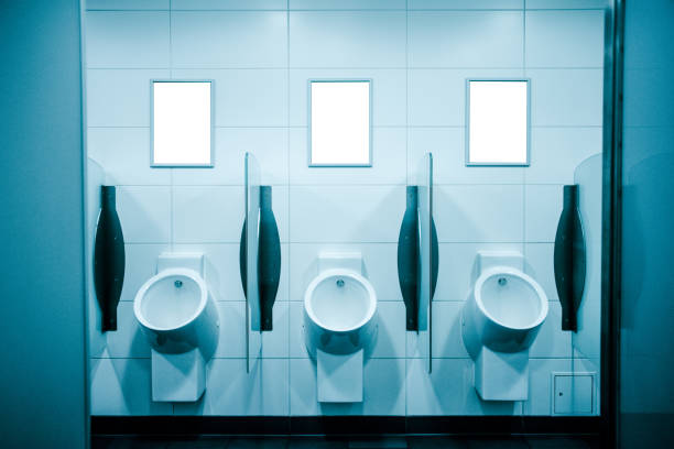 blank billboards at public toilet - urinal clean contemporary in a row imagens e fotografias de stock