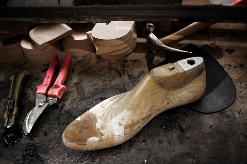 Shoemaker making shoes
