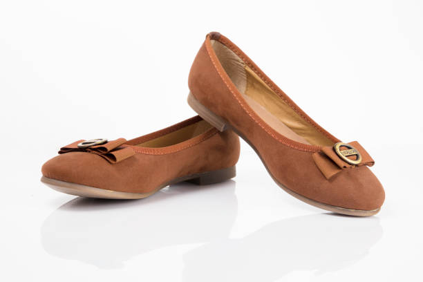 istock Female brown leather shoe on white background, isolated product. 1032018722