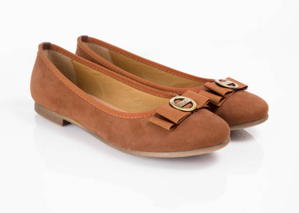 istock Female brown leather shoe on white background, isolated product. 1032018992