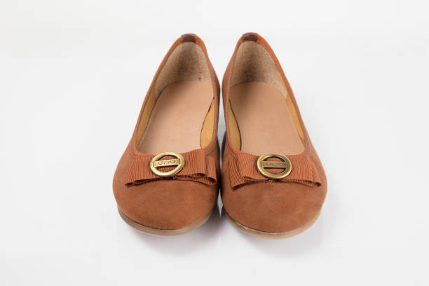 istock Female brown leather shoe on white background, isolated product. 1032019730