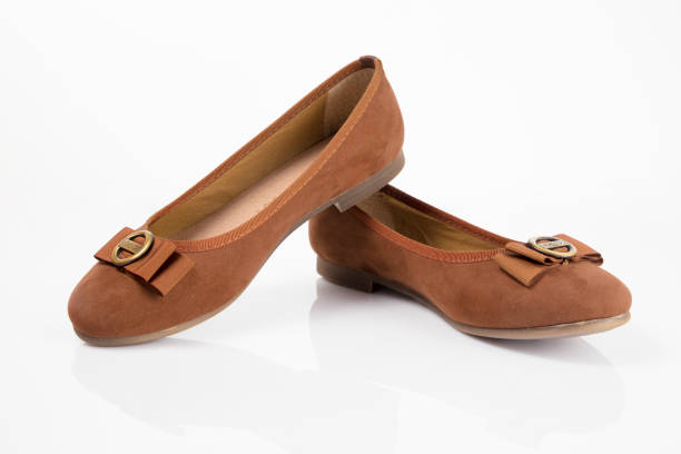 istock Female brown leather shoe on white background, isolated product. 1032019796