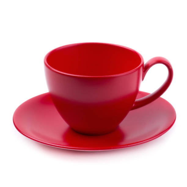 istock Red coffee mug and saucer isolated on white background 1032028560