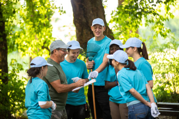 istock Group of volunteers outdoors on a meeting 1032032484