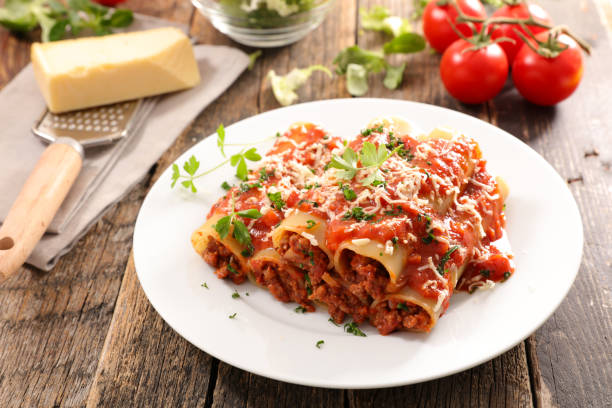 istock canneloni with beef and tomato sauce 1032032738