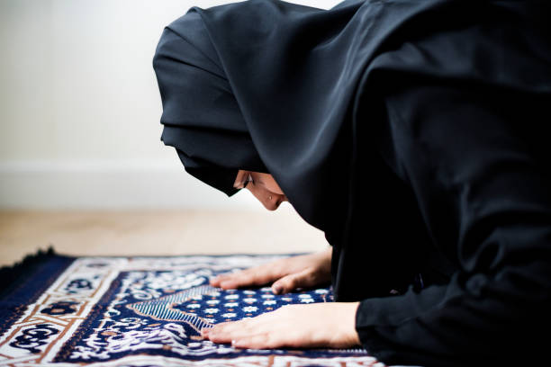 istock Muslim woman praying in Sujud posture 1032034704