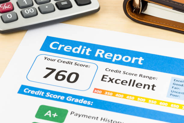 istock Credit score report with calculator and organizer book 1032035476
