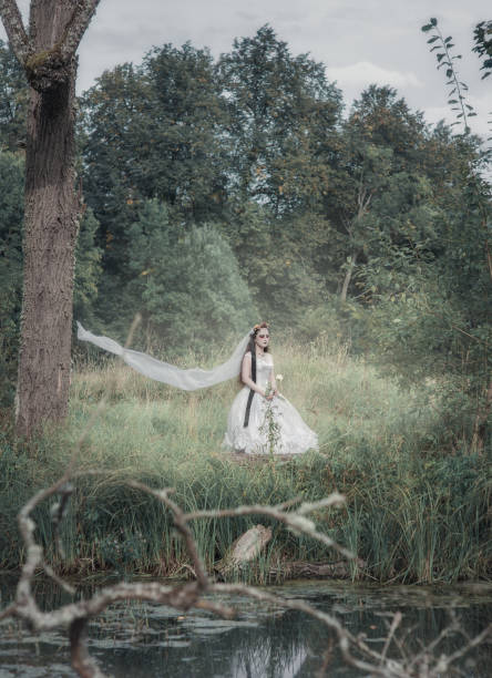 istock Creepy dead bride in the forest. Halloween scene 1032039302