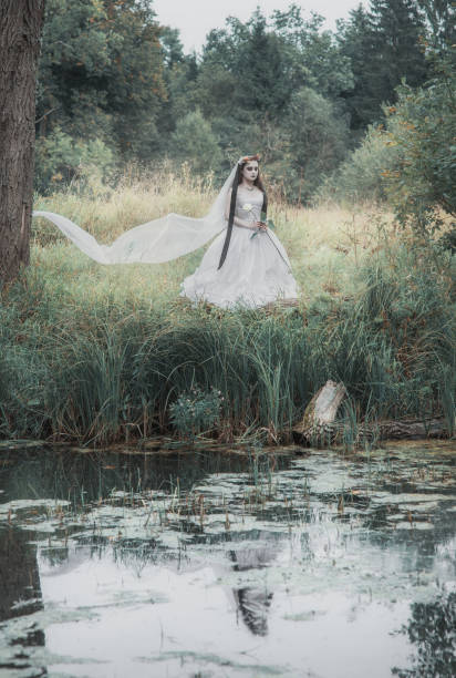 istock Creepy dead bride in the forest. Halloween scene 1032039378