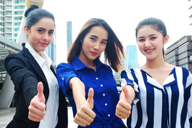 istock Beautiful women Join hands business concept and handshake concept 1032040662