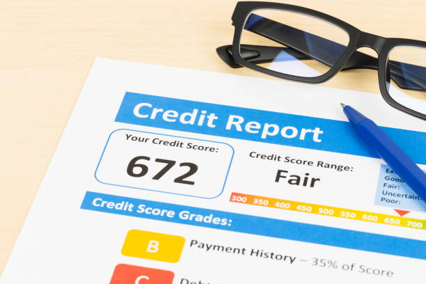 istock Fair credit score report with pen 1032041384
