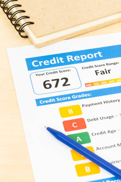 istock Fair credit score report with pen 1032041430