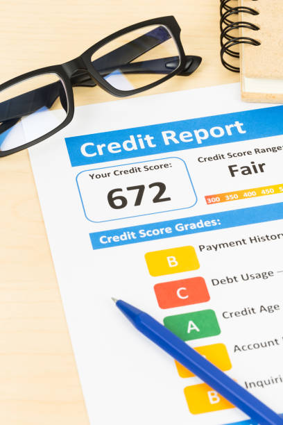 istock Fair credit score report with pen 1032041444