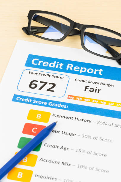 istock Fair credit score report with pen 1032041456