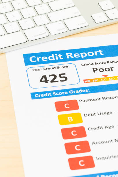 istock Poor credit score report on wrinkled paper with keyboard 1032041520