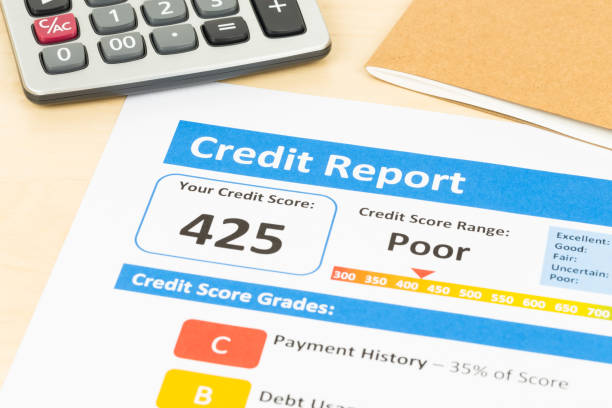 istock Poor credit score report with calculator 1032041580