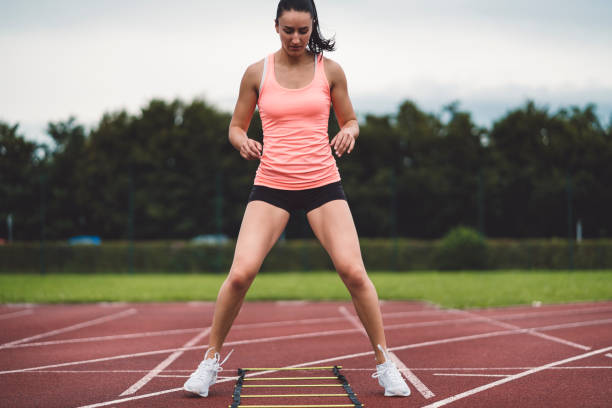 istock Strong female athlete focused on her training 1032041888
