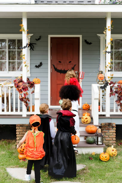 istock Little children trick or treating 1032044392