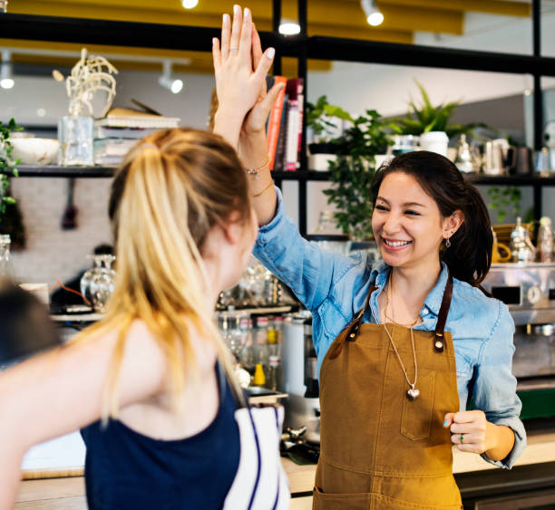 istock Women give a high five to each other 1032045022