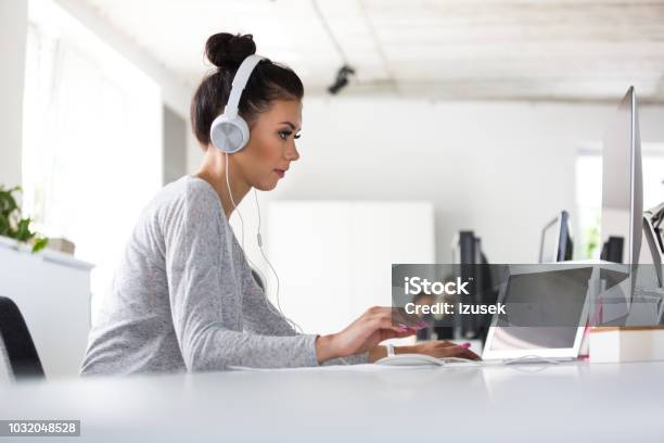 Application Developer Working On Computer In Office Stock Photo - Download Image Now