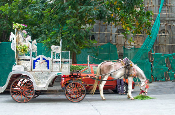 Mumbai, India - November 15, 2010: Old fashioned taxi in Mumbai captured on a bright sunny day.