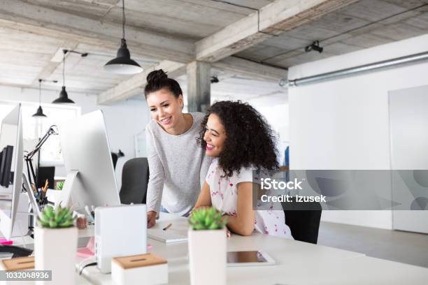 Software Engineers Working Together On Project Stock Photo - Download Image Now - Office, Poland, Working