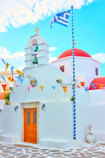 istock Small white orthodox church in Greece 1032053462