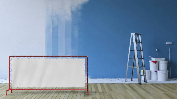 istock Painting wall blue in an empty room 1032062240