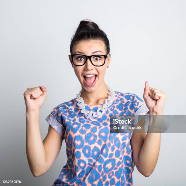 Happy Young Woman Looking Excited Stock Photo - Download Image Now - Front View, Human Face, Winning
