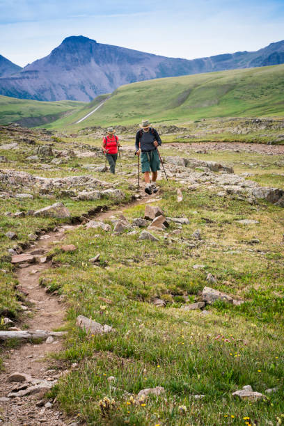 istock Senior couple hiking Continental Divide Trail in CO 1032067110