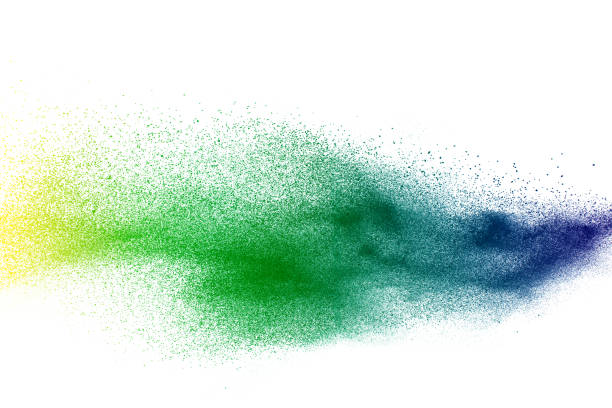 explosión de polvo multicolor abstracto sobre fondo blanco. congelar movimiento de salpicaduras de partículas de polvo de color. holi pintado - verde color fotografías e imágenes de stock