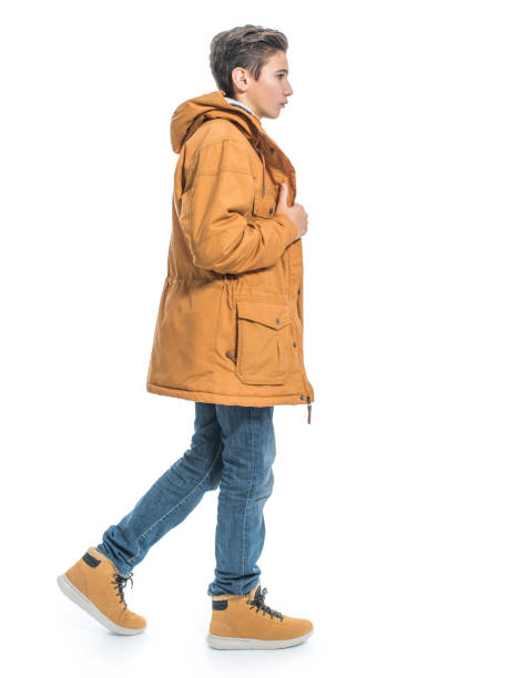 istock Teenage boy in winter clothes 1032078060