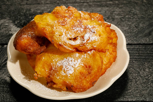 istock Small homemade doughnuts are sugar coated 1032081676