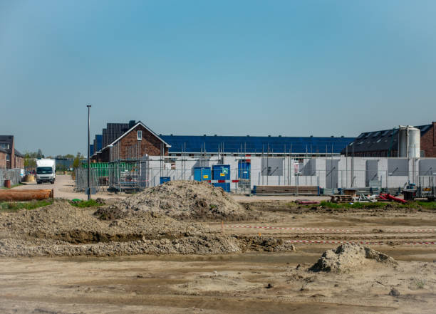 istock Urban city expands  into farmland 1032083886