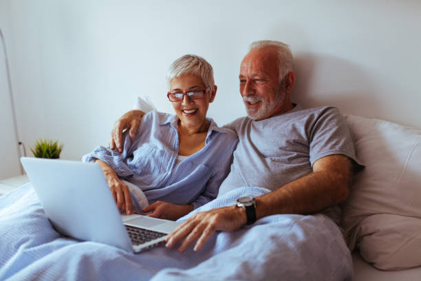 istock Happy senior couple relaxed at home 1032088710