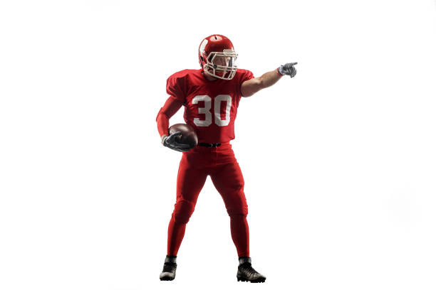 istock one american football player man studio isolated on white background 1032089484