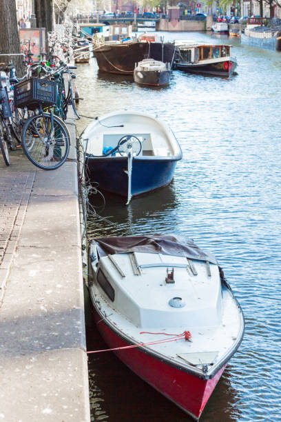 istock Boats Moored in Amsterdam 1032089488