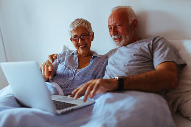 istock Happy senior couple relaxed at home 1032093798