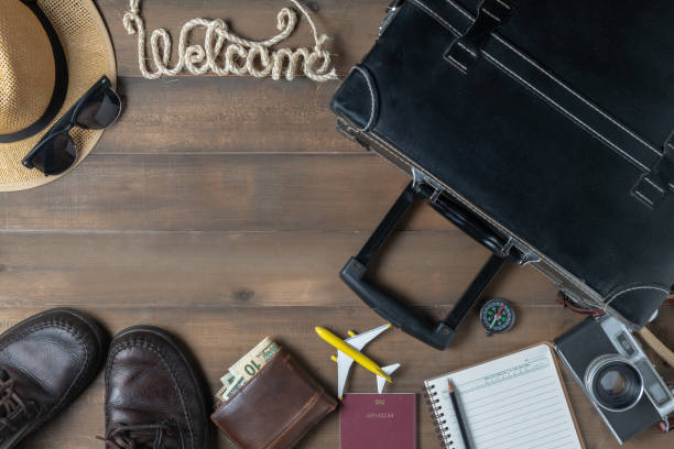 istock Old black vintage suitcase with welcome text 1032100232
