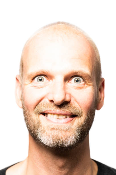 istock Silly faced middle-aged Caucasian male on white 1032104454