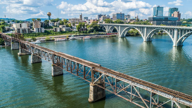 Train Bridge and Road Bridge Train Bridge and Road Bridge into Knoxville, Tennessee. railway bridge photos stock pictures, royalty-free photos & images