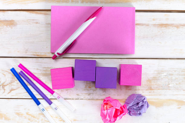 istock School supplies on wooden background 1032118058