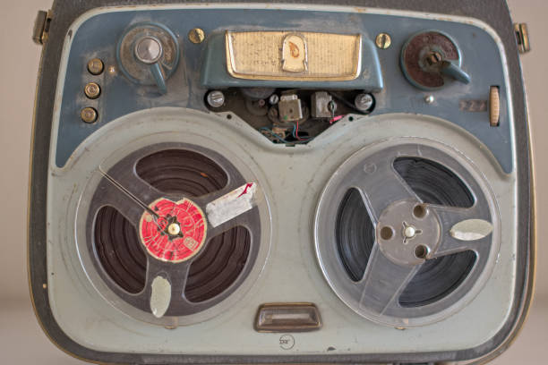 Vintage cassette tape player with the tape deck opened circa 1980s - isolated.