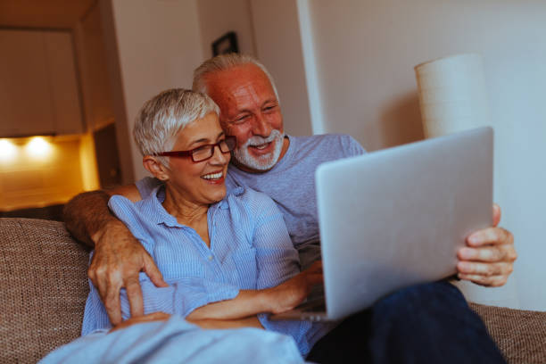istock Happy senior couple relaxed at home 1032129122