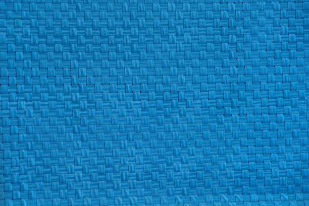 light blue plastic texture of a wicker wall - fake rattan imagens e fotografias de stock